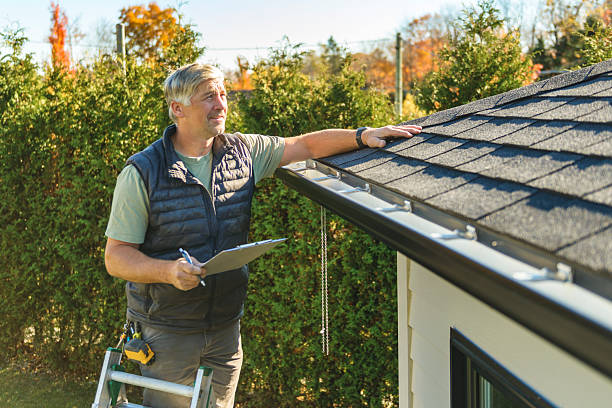 Professional Roof Inspection technician working in Malden, MA